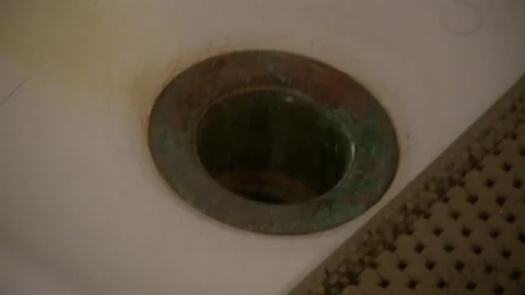 Extreme Close Up - Rusty Drain Stock Footage 87057048