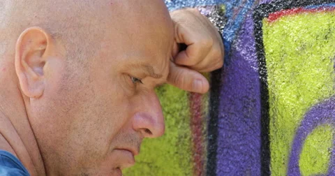 Extreme Close Up Sad Man Suffering Worried Suffering Person Graffiti Wall Paint 스톡 동영상 61454787