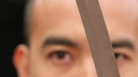 Extreme Close Up Samurai Sword Sheathing Stock Footage 10816680