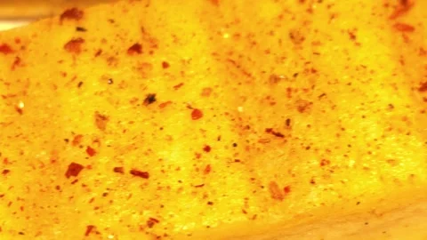 Extreme close-up sequence of seasoned pan-seared tofu Vidéo 344853270