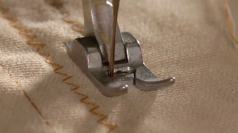 Extreme close up on a sewing machine showing process. Stock Footage 78773074
