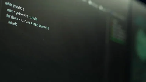 Extreme close up shot of lines of code displayed on computer monitors 動画素材 275861796