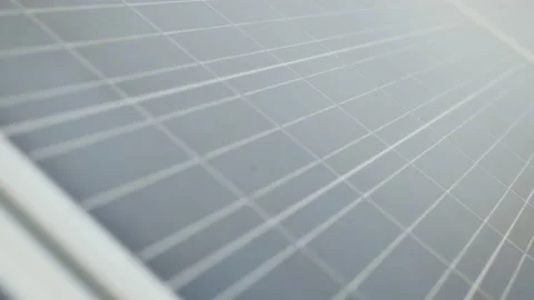 Extreme close up slide camera shot of the panels of small solar power plant Stock Footage 168527272