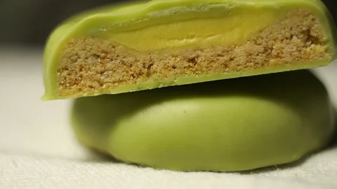 Extreme Close Up Slider Shot of Two Matcha Biscuits in 50p Stock Footage 337016973