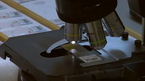 Extreme close up of slides on microscope.mp4 Stock Footage 42262666