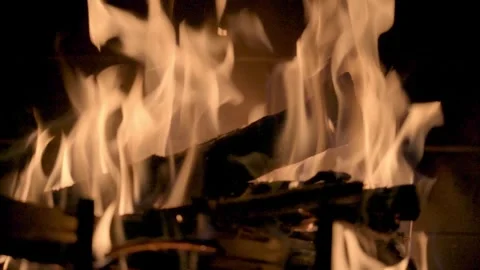 Extreme Close up slow motion blazing fire in fireplace Ellijay Georgia 4k Stock Footage 260742998