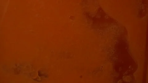 Extreme close up slow motion, blending carrot juice from piece of carrot Stock-Footage 137769386