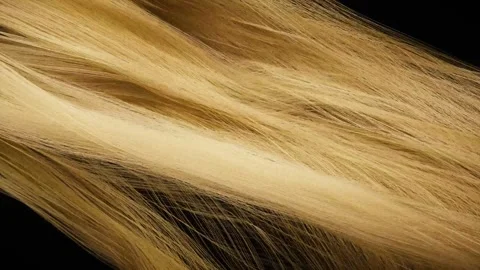Extreme close up slow motion movement of blond synthetic fibers texture Stock Footage 327524466