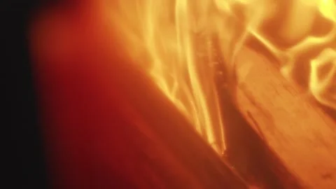 Extreme close up of slow motion roaring wood fire and flames  Stock Footage 146270866