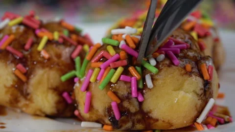 Extreme close up slow-motion splitting the eclair showing the softness 库存影片 135641866