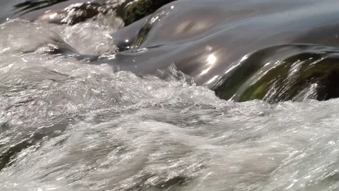 Extreme close up of a small creek Stock Footage 86738342