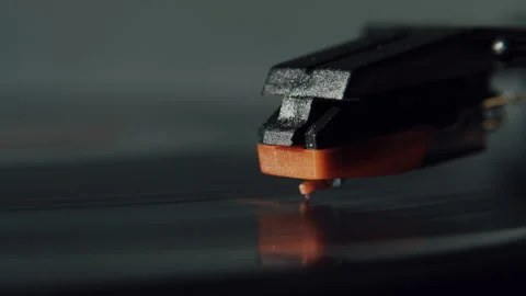 Extreme Close Up of Stylus on Rotating Vinyl Record Stock Footage 345397817
