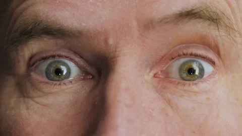 Extreme close up of surprised or shocked elderly middle aged man. Stock Footage 144752256