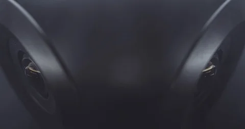 Extreme close-up of a surveillance camera watching and tracking Stock Footage 121018528
