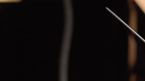 Extreme Close Up of Syringe Needle and Transparent Plastic Hub Against Dark 스톡 동영상 345101477