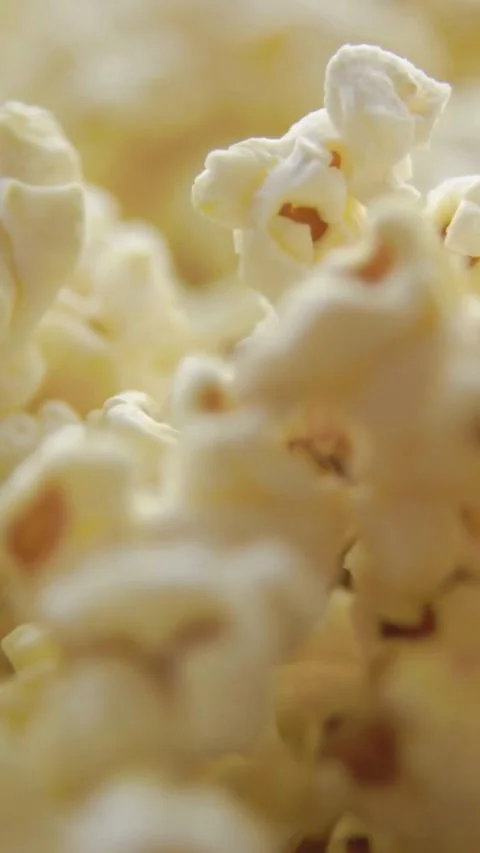 Extreme close up texture of fresh white salty popcorn Stock Footage 334183928