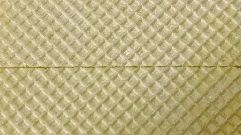Extreme close-up, top-down view of a plain wafer. Stock Photos