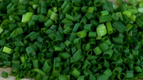 Extreme close up turn the chopped Spring onion around Stock-Footage 136352093