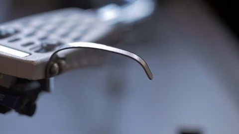 Extreme close up of turntable stylus removed from cradle Stock Footage 88762136