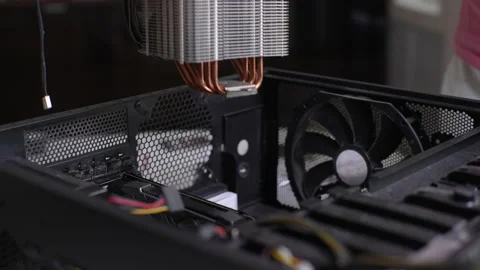 Extreme close-up of unrecognizable male master removing PC CPU air cooling Stock Footage 234003606