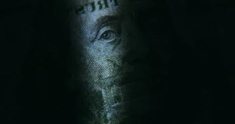 Extreme Close-Up of a US 100 Dollar Banknote Illuminated from Beneath Stock Footage 346404551