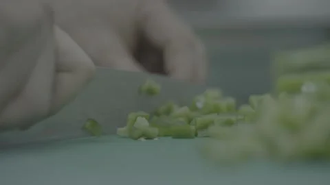 Extreme close-up vegetable dicing on a commercial cutting board Stock-Footage 327355584