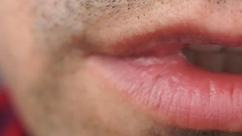 Extreme close up video man's lips speaks Stock Footage 87141540