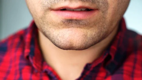 Extreme close up video man's lips speaks Stock Footage 87141735