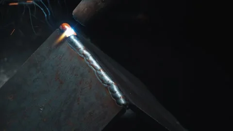 Extreme Close Up View Of Metal Welding Creating Massive Stream Of Sparks Stock Footage 338041561