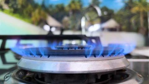 Extreme Close View of Stove Lighting Up Stock Footage 307678151