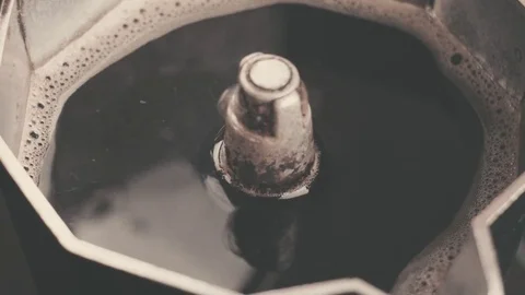 Extreme close-up view of using a vintage brewed coffee maker machine Stock Footage 79719562