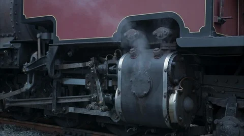 Extreme close up on Vintage steam Engine in the station Stock Footage 128361950