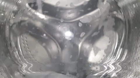 Extreme close-up of washing machine drum II, empty wash - medium speed Stock Footage 302894012