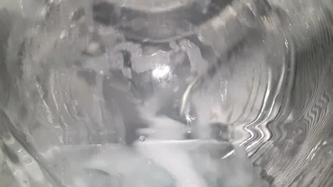 Extreme close-up of washing machine drum I, empty wash - high speed Stock Footage 302894024