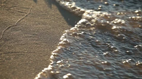 Extreme close of waves on sand 스톡 동영상 44231276