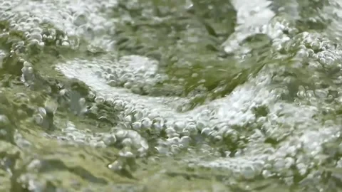 Extreme close-up waves in water Stock Footage 241171716