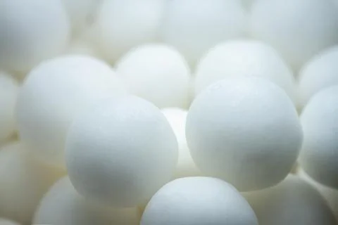Extreme close up of white small peppermint candy balls 스톡 사진