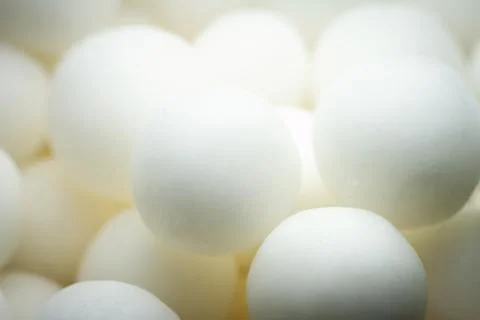 Extreme close up of white small peppermint candy balls 스톡 사진