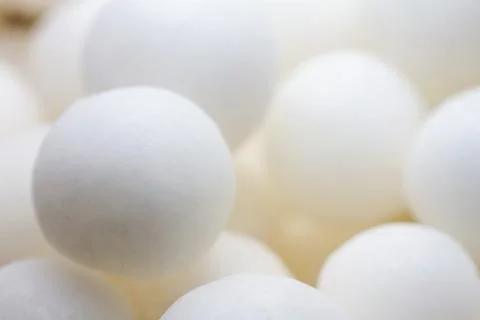 Extreme close up of white small peppermint candy balls 스톡 사진