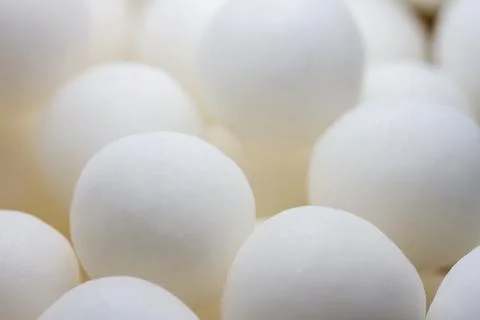 Extreme close up of white small peppermint candy balls Stock Photos