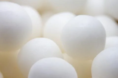 Extreme close up of white small peppermint candy balls Stock Photos