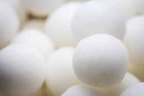 Extreme close up of white small peppermint candy balls Stock Photos