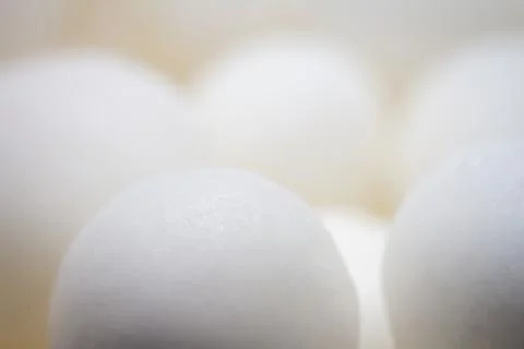 Extreme close up of white small peppermint candy balls Foto stock