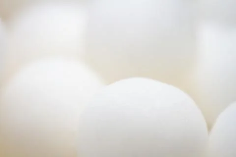 Extreme close up of white small peppermint candy balls Stock Photos