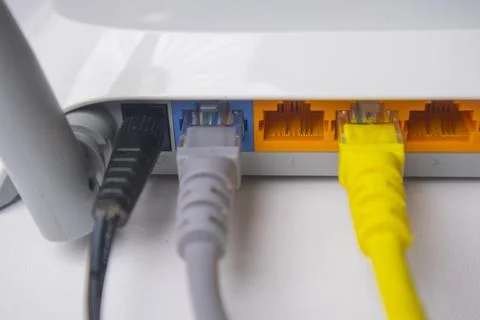 Extreme close-up of a white wireless router back panel showing the connecti.. Stock Photos