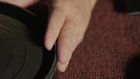 Extreme close up womans hand loading 35mm film inside old film camera magazine Stock Footage 127246039