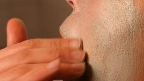 Extreme close up of woman's hands massaging the skin of the face Stock Footage 101239374