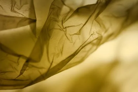 Extreme close up of yellow plastic texture background. Stock Photos
