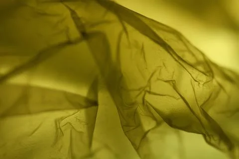 Extreme close up of yellow plastic texture background. Stock Photos