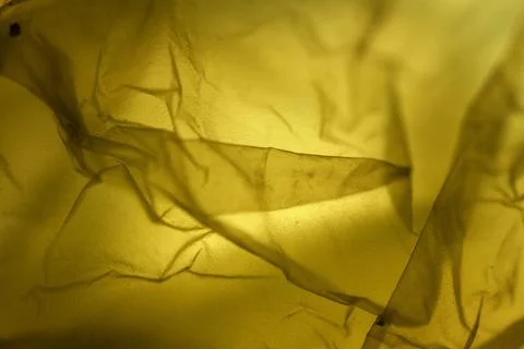 Extreme close up of yellow plastic texture background. Stock Photos